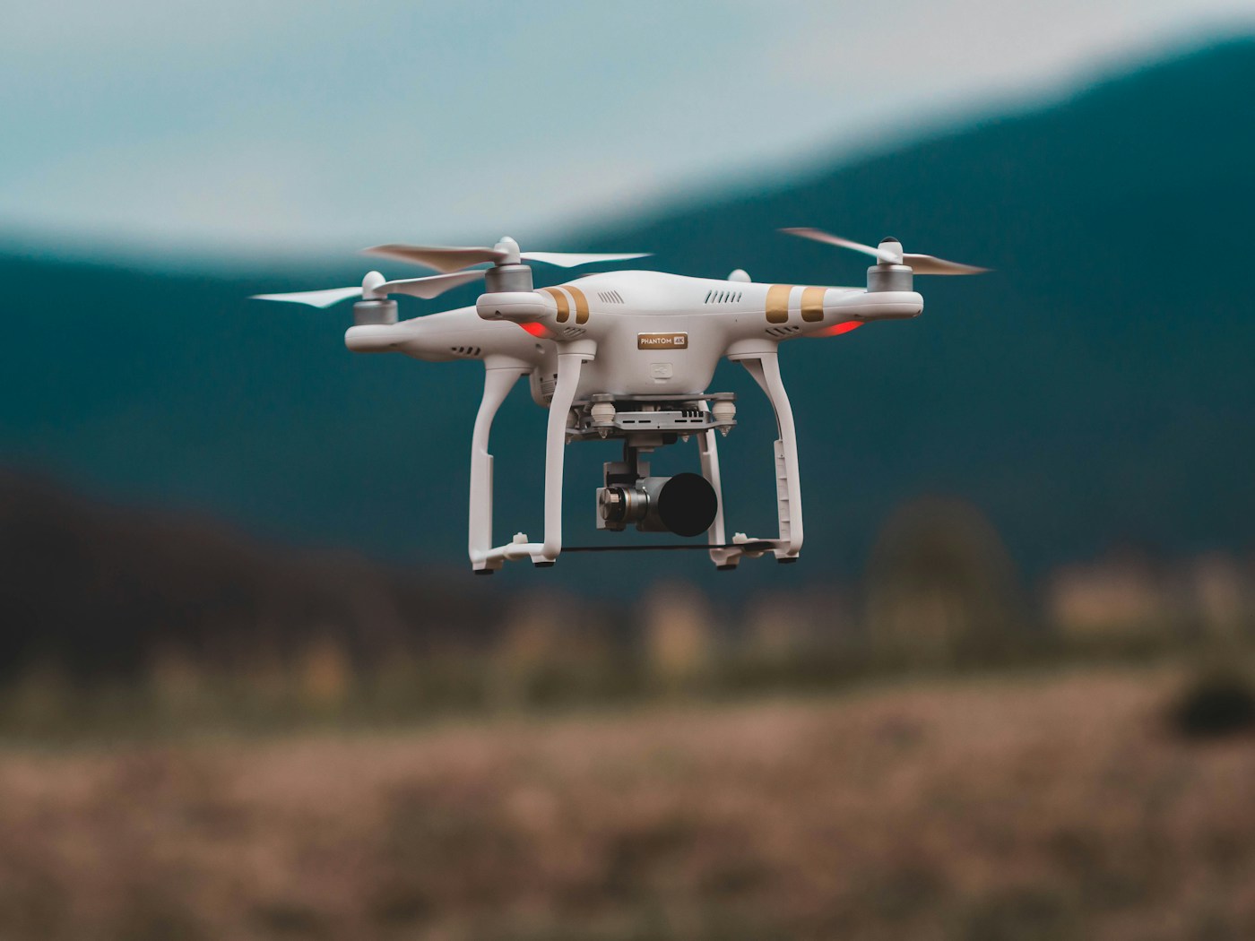 Quadcopter carrying a camera in flight